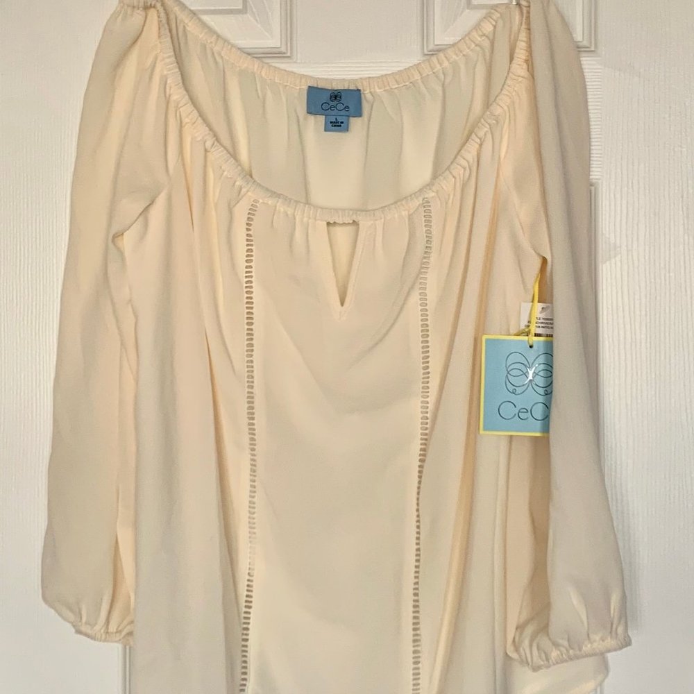 Cream off-the-shoulders blouse